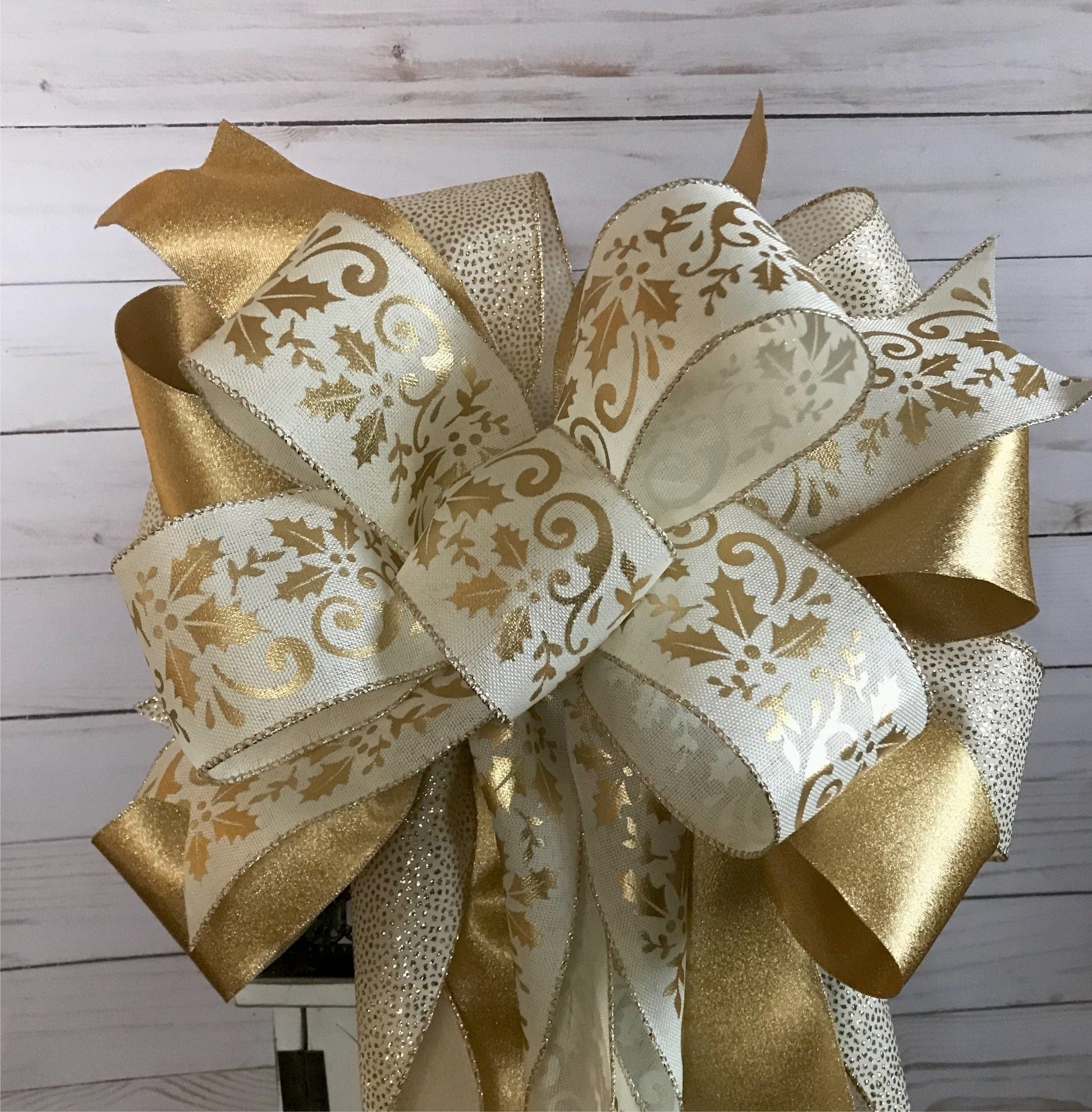 Adriana Ortiz Designs Holiday ornament White and Gold Christmas tree bow topper. Gold Fireplace Mantel Decoration. Gold Wreath bow.