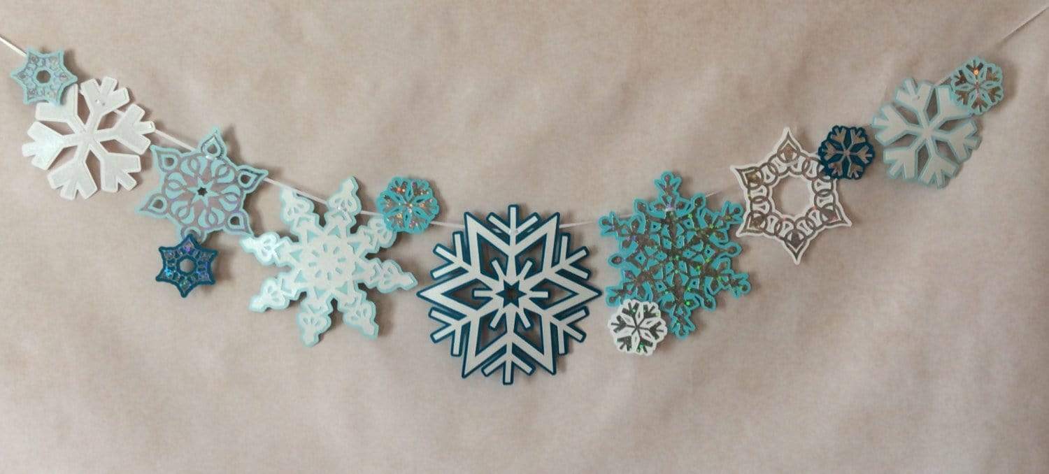 Handmade Holiday // Paper Snowflake Garland - ARTBAR